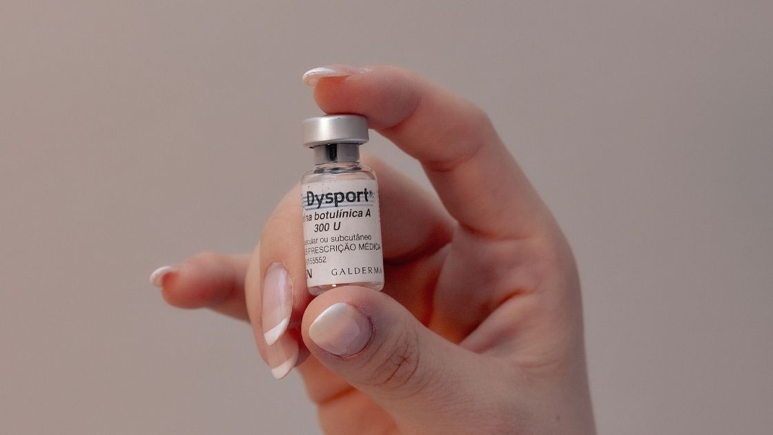 Dysport injection between the brows to soften frown lines at a medical spa in London, Ontario